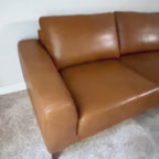Top grain leather sectional sofa in a modern 1 bedroom apartment living room 